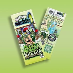 One Up Multiverse Matcha Milk Tea Chocolate Bar packaging featuring a vibrant green design, highlighting the chocolate bar infused with matcha and milk tea flavors, set against a wooden background